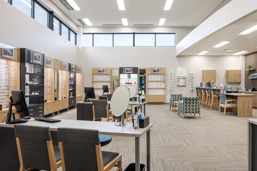 Atmosphere Commercial Interiors and the RVA design team collaborated to select furniture finishes that coordinated with Chippewa Valley Eye Clinic's building finishes.