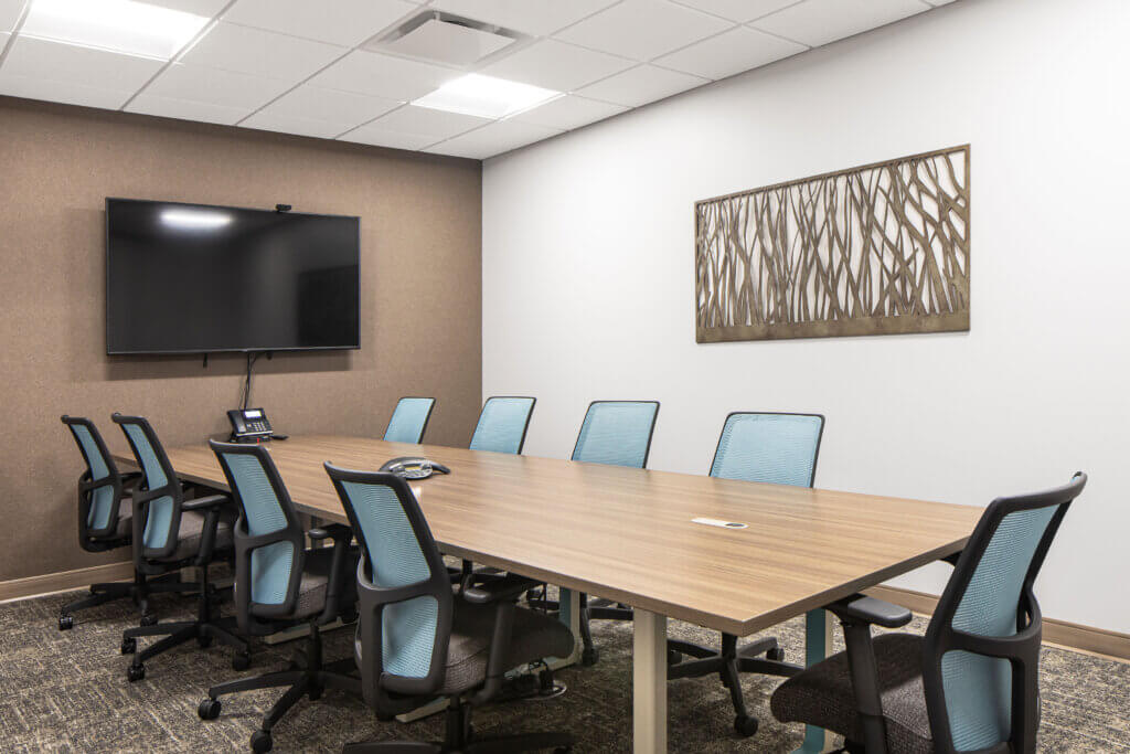 Atmosphere Commercial Interiors and the RVA design team collaborated to select furniture finishes that coordinated with Chippewa Valley Eye Clinic's building finishes.