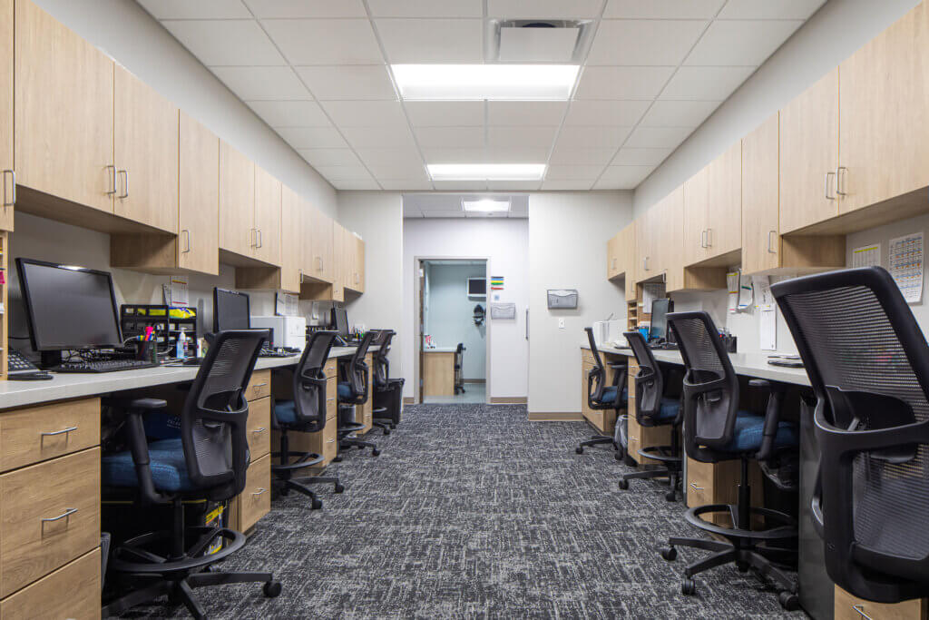 Atmosphere Commercial Interiors and the RVA design team collaborated to select furniture finishes that coordinated with Chippewa Valley Eye Clinic's building finishes.