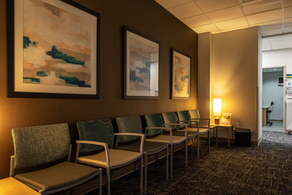 Atmosphere Commercial Interiors and the RVA design team collaborated to select furniture finishes that coordinated with Chippewa Valley Eye Clinic's building finishes.